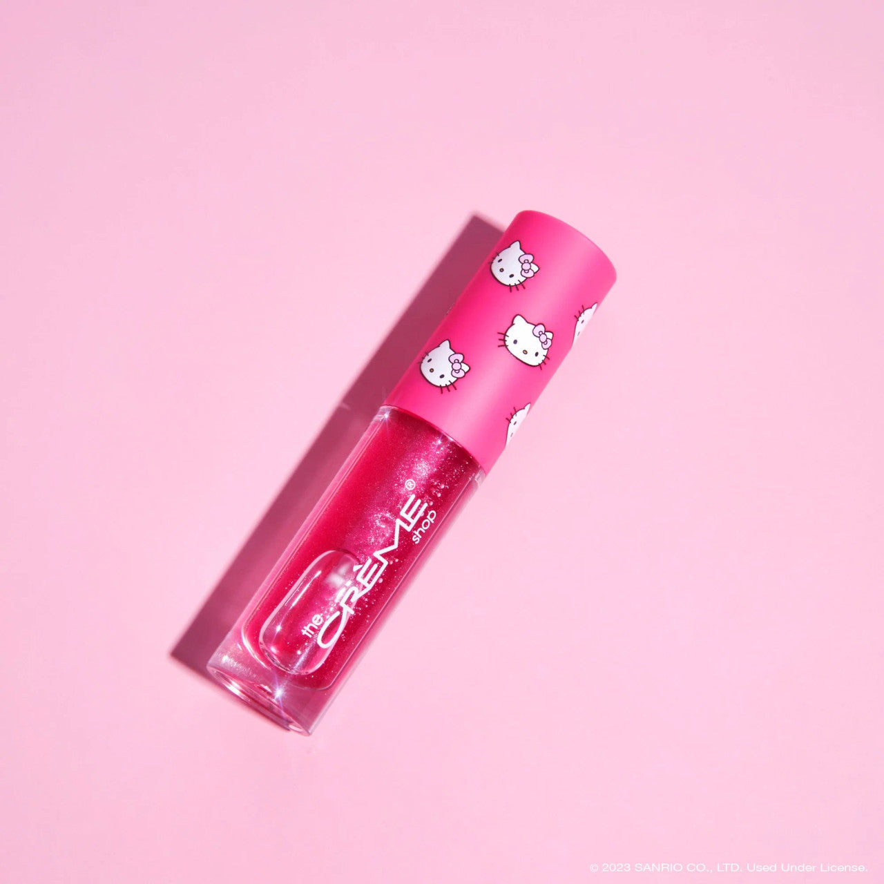 THE CREME SHOP X Hello Kitty Kawaii Kiss Shimmer Lip Oil - BERRY GUMMY