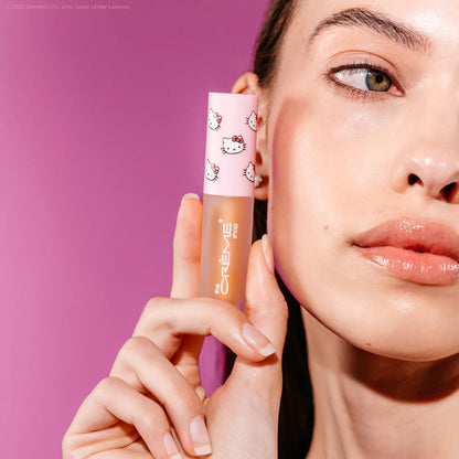 THE CREME SHOP Hello Kitty Kawaii Kiss Moisturizing Lip Oil (Vanilla Mint Flavored)