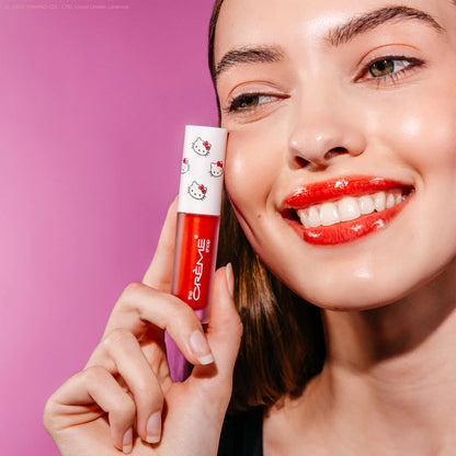 THE CREME SHOP Hello Kitty Kawaii Kiss Moisturizing Lip Oil (Apple Flavored)